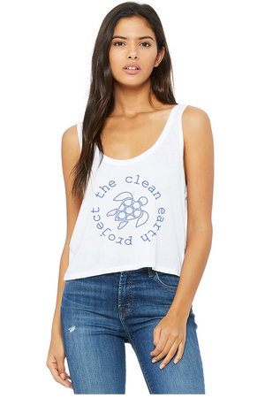 girl with white tank top with blue turtle logo