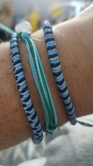 3 bracelets on wrist